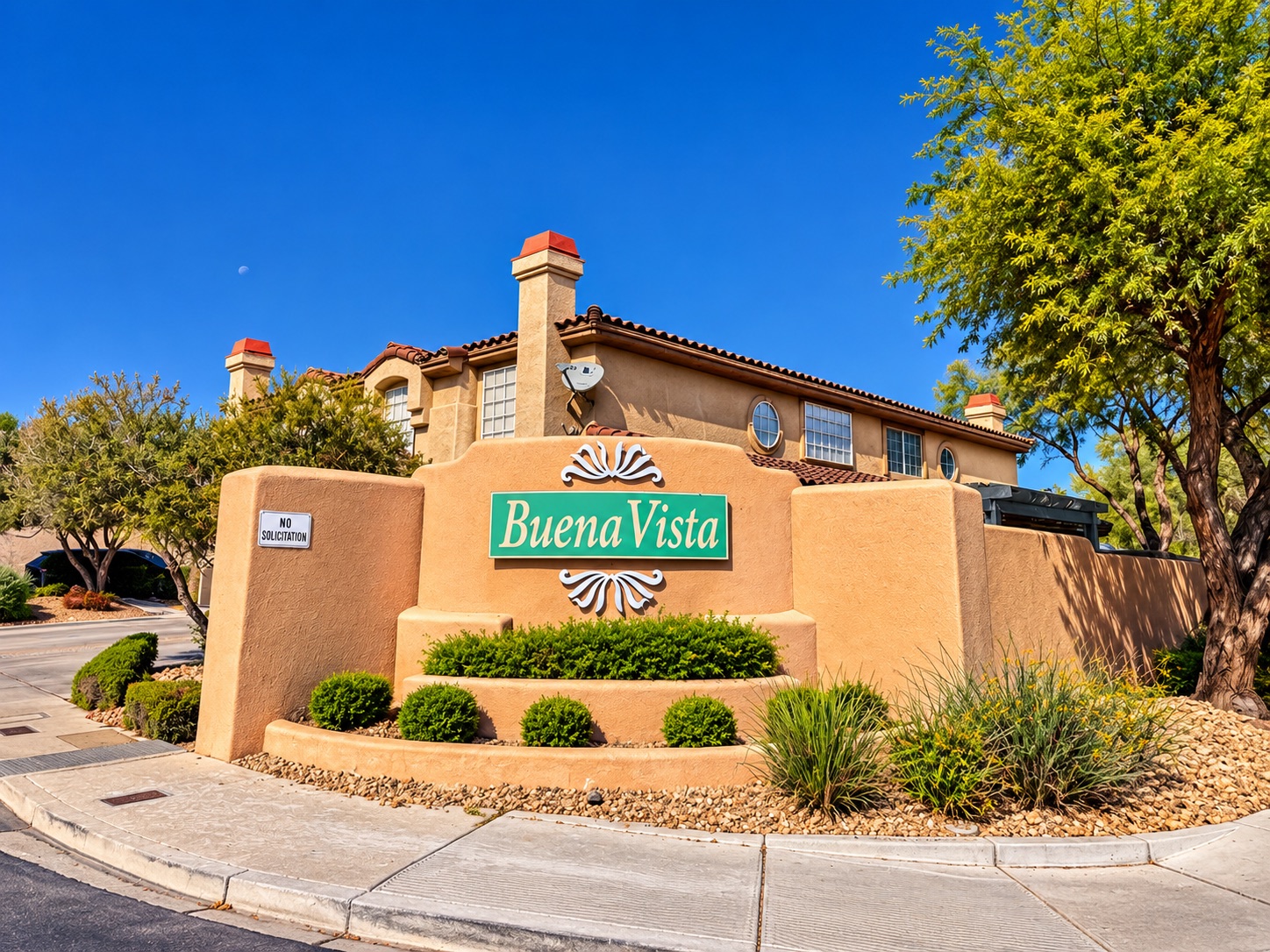 Buena Vista entrance sign and two-story townhomes in The Pueblo, Summerlin, Las Vegas, Nevada 89128
